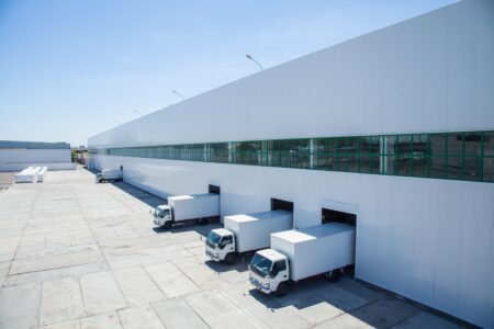 Facade,Of,An,Industrial,Building,And,Warehouse,With,Freight,Cars
